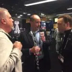 Willy Daunic interviews Sportsnet's Elliotte Friedman with the hockey stick mic. (Photo credit: ESPN 102.5 The Game / Ryan Porth)