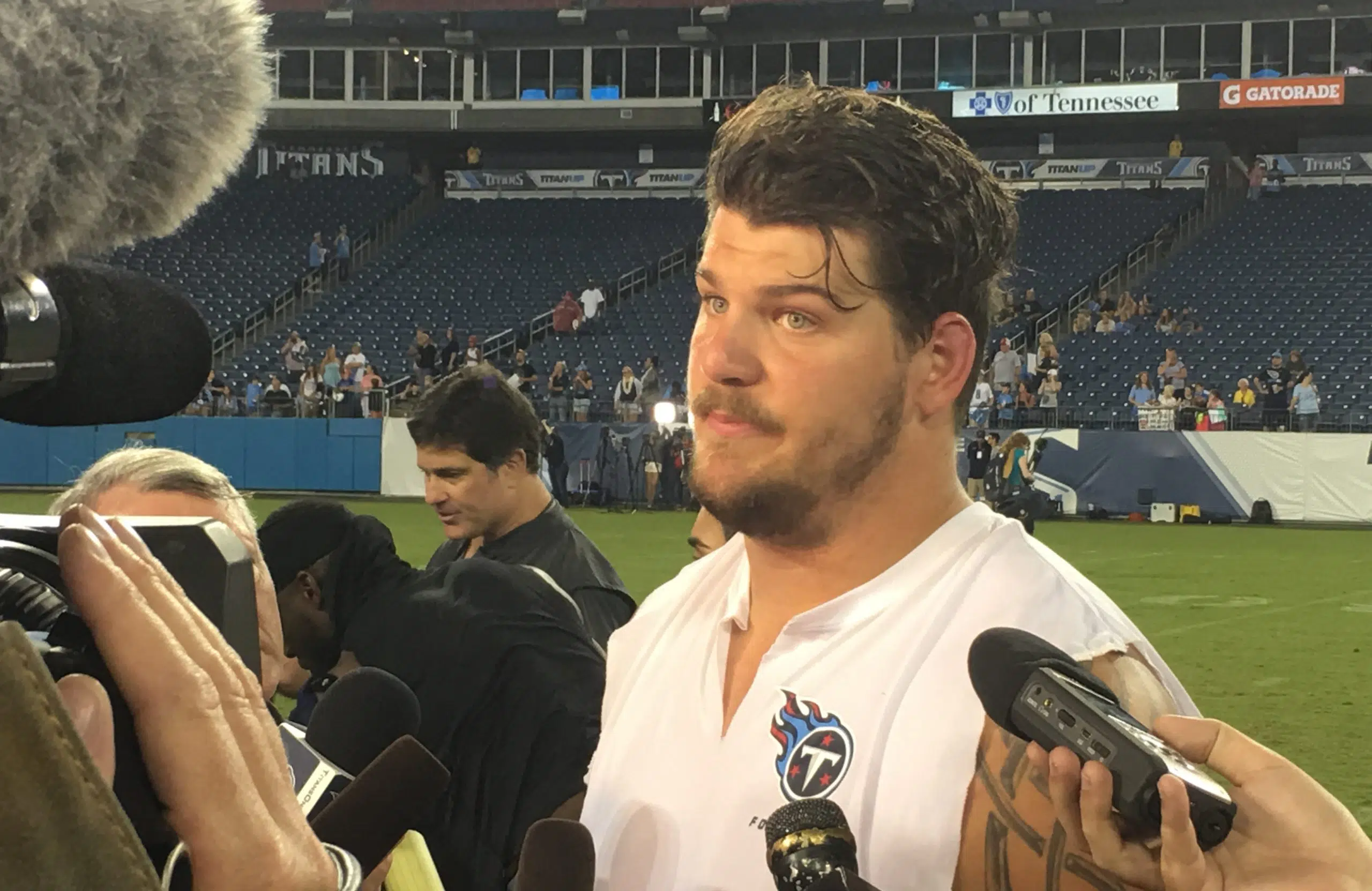 Lewan reports for preseason camp