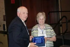 Mike Sullivan, Mattoon, Lake Land College Trustee, left, pictured with Kathy Spears, ICCTA secretary, was honored with ICCTA's 2017 Ray Hartstein Trustee Achievement Award. Sullivan also received two other honors: the 30-Year Trustee Award for longtime service on the Lake Land College Board of Trustees and the Linden A. Warfel Trustee Education Award for completion of 100 ICCTA professional development seminars.