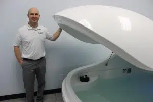 Chris Dreas opens one of the Float Tanks in Float Effingham
