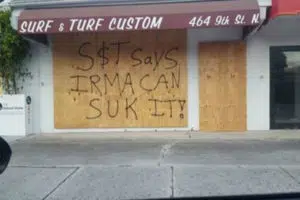 A surf shop in Naples, Fla. boarded up its windows before people evacuated the community Sept. 8, 2017. (Submitted by Bob Utigaard)