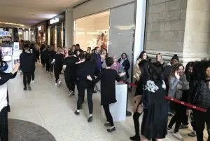 H and M Opening - staff high fiving people in line - JG - March 29 2018