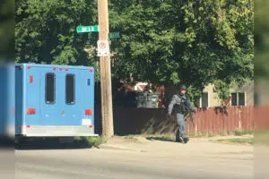 One man arrested after a stand at a home on 33rd Street West near Avenue H Aug. 6, 2017. (Celine Grimard/650 CKOM)