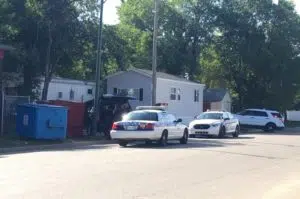 Saskatoon police arrest one person after a standoff on 11th Street W on Monday. (Celine Grimard/650 CKOM)