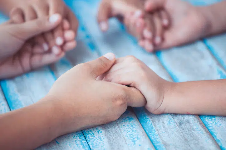 children praying hands background