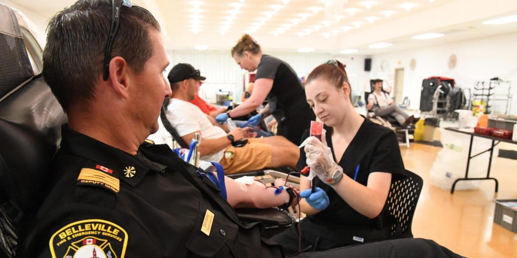 Belleville firefighters and police officers supporting Canadian Blood Services - Vimarsana News