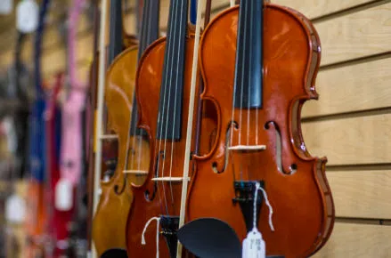 A colourful assortment of violins and sting instruments for sale at Greenbacks make for great Christmas gifts.  (Photo: Nicole Kleinsteuber / Green Quinte)