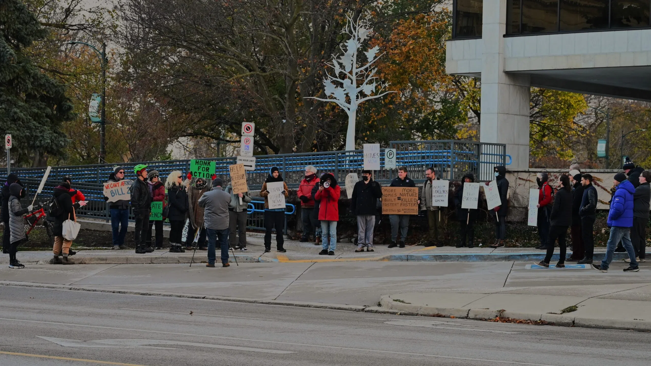 Dozens of Londoners stood outside City Hall to protest against Ontario’s New Housing Bill