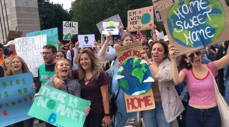 WATCH: “We are unstoppable, another world is possible!”: local climate strikers flood downtown with message