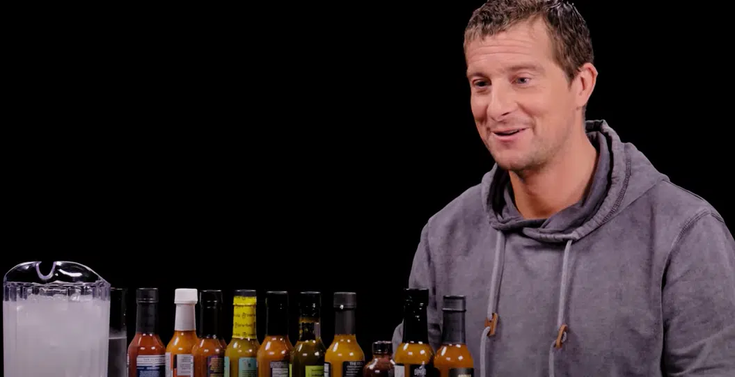 Hot Ones) Bear Grylls Battles For Survival Against Spicy Wings | ENERGY 106