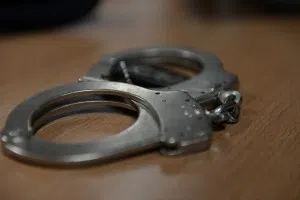 SPANGDAHLEM AIR BASE, Germany – Handcuffs rest on a table inside the security forces building during a training exercise April 2, 2013. If a security forces member suspects a person of a crime, they must detain them and search their person for weapons and illegal substances. (U.S. Air Force photo by Airman 1st Class Gustavo Castillo/Released)