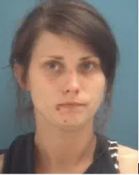 Woman arrested after trying to disarm an officer