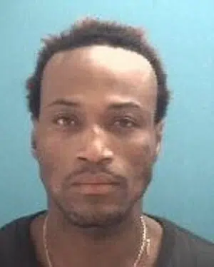 Man arrested for breaking into apartment, drugs