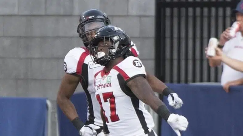 Montreal, Canada. 01st July, 2023. Montreal Alouettes quarterback Cody  Fajardo (7) hands off to running back William Stanback during first half  CFL football action against the Winnipeg Blue Bombers in Montreal, Saturday