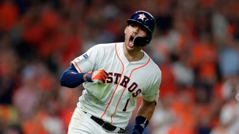 Cole fans 15, Bregman homers as Astros top Rays 3-1