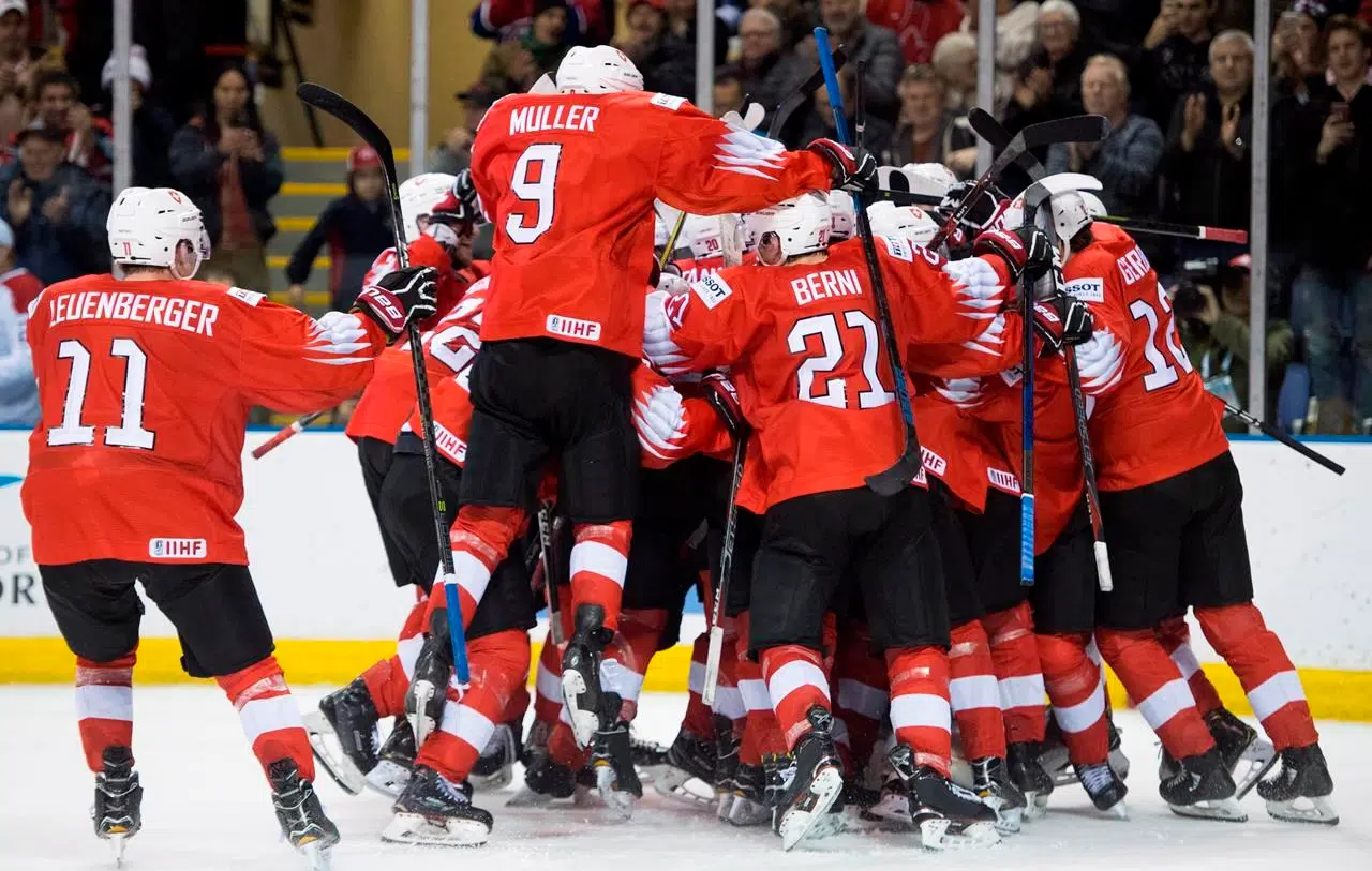 Swiss juniors upset top-ranked Sweden in world hockey quarterfinal ...