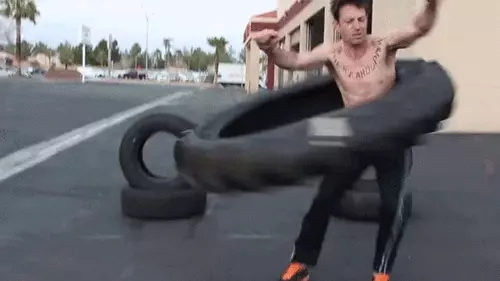 Dizzy Hips Hula-Hooping a tractor tire