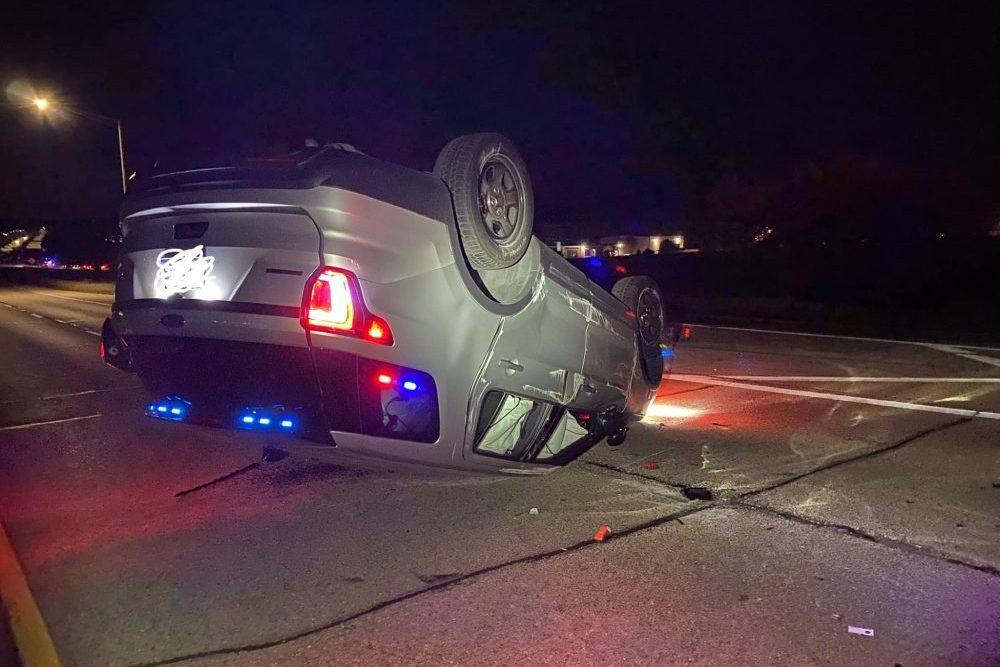 Police officers narrowly avoid injury after car crashes into squad car - Vimarsana News