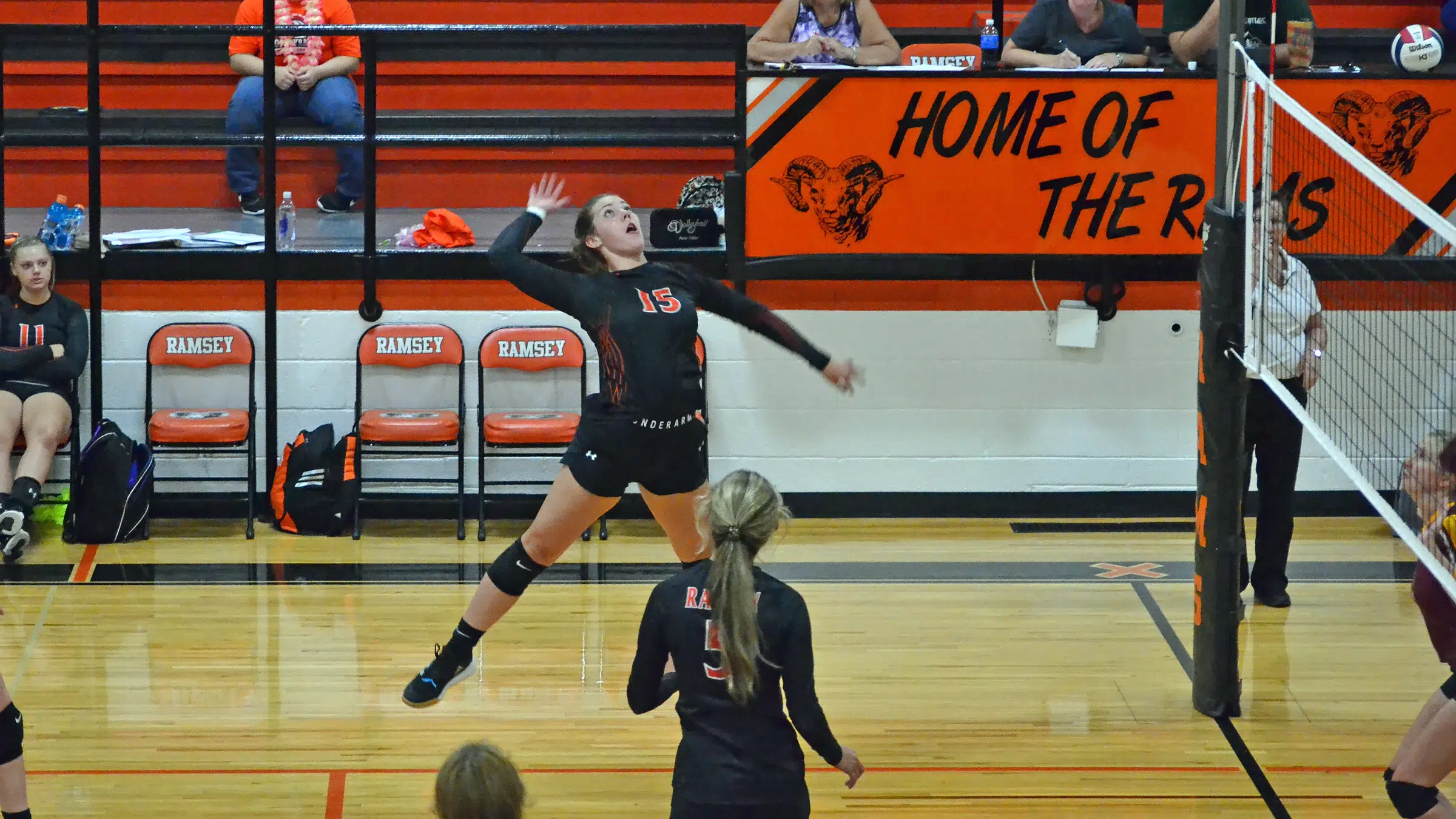 Ramsey Volleyball gets win in season opener, JV falls