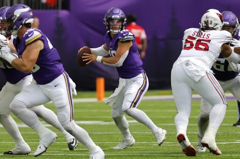 Arizona Cardinals wide receiver Davion Davis (10) runs down the field  during the first half of an NFL preseason football game against the  Minnesota Vikings, Saturday, Aug. 26, 2023, in Minneapolis. (AP