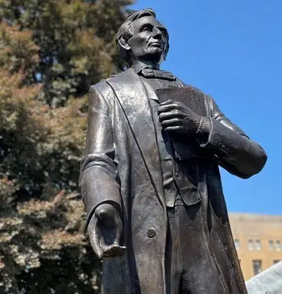Statue of Young Abraham Lincoln is vandalized with red paint on