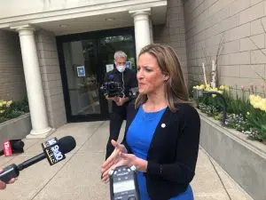 May 4, 2021; Holland, MI, USA; Michigan Secretary of State Jocelyn Benson answers reporters' questions in front of Holland City Hall during an appearance on Election Day. Gary Stevens/Midwest Communications