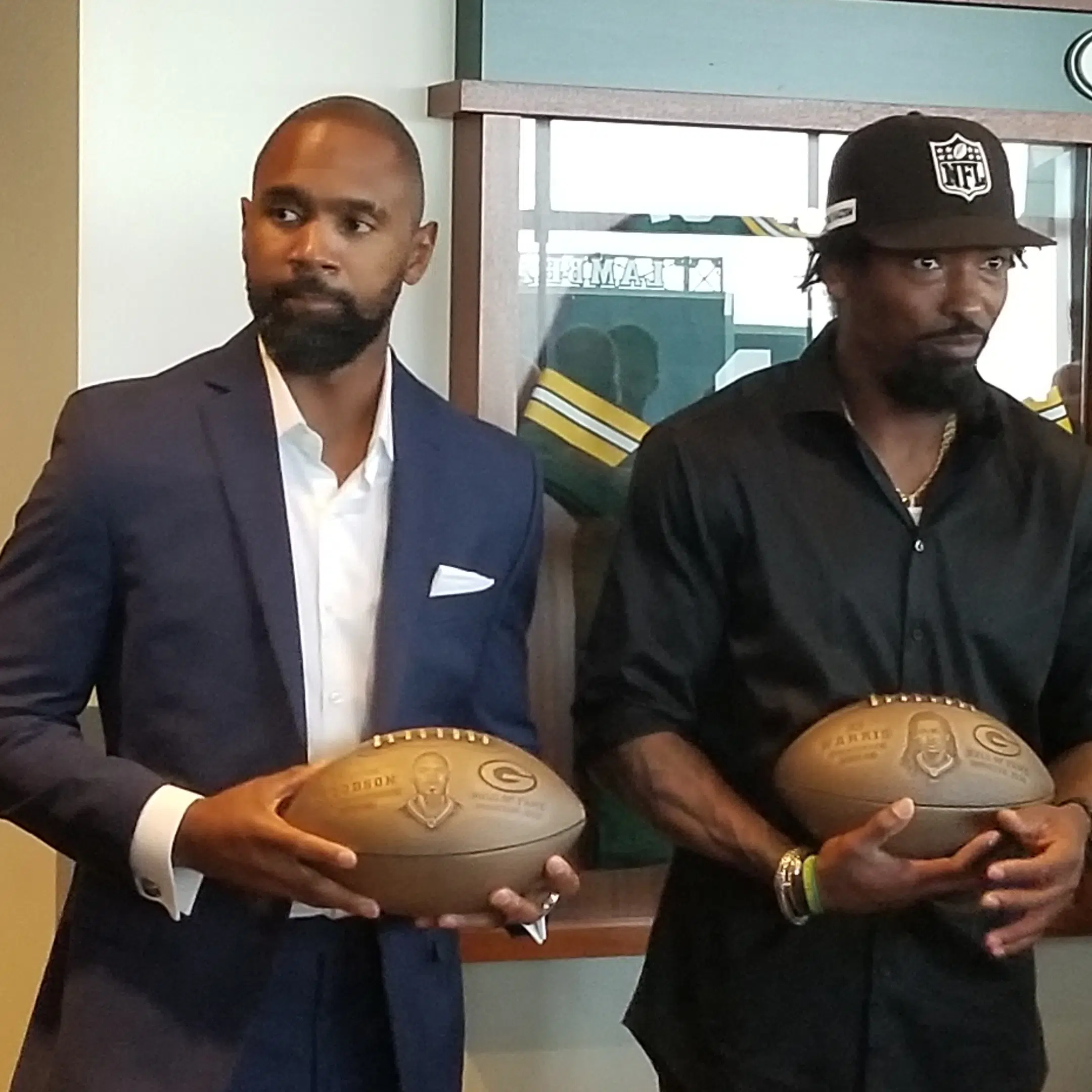 Al Harris & Charles Woodson's bronze football installation, Al Harris & Charles  Woodson will be forever honored in the #PackersHOF., By Green Bay Packers  Hall of Fame