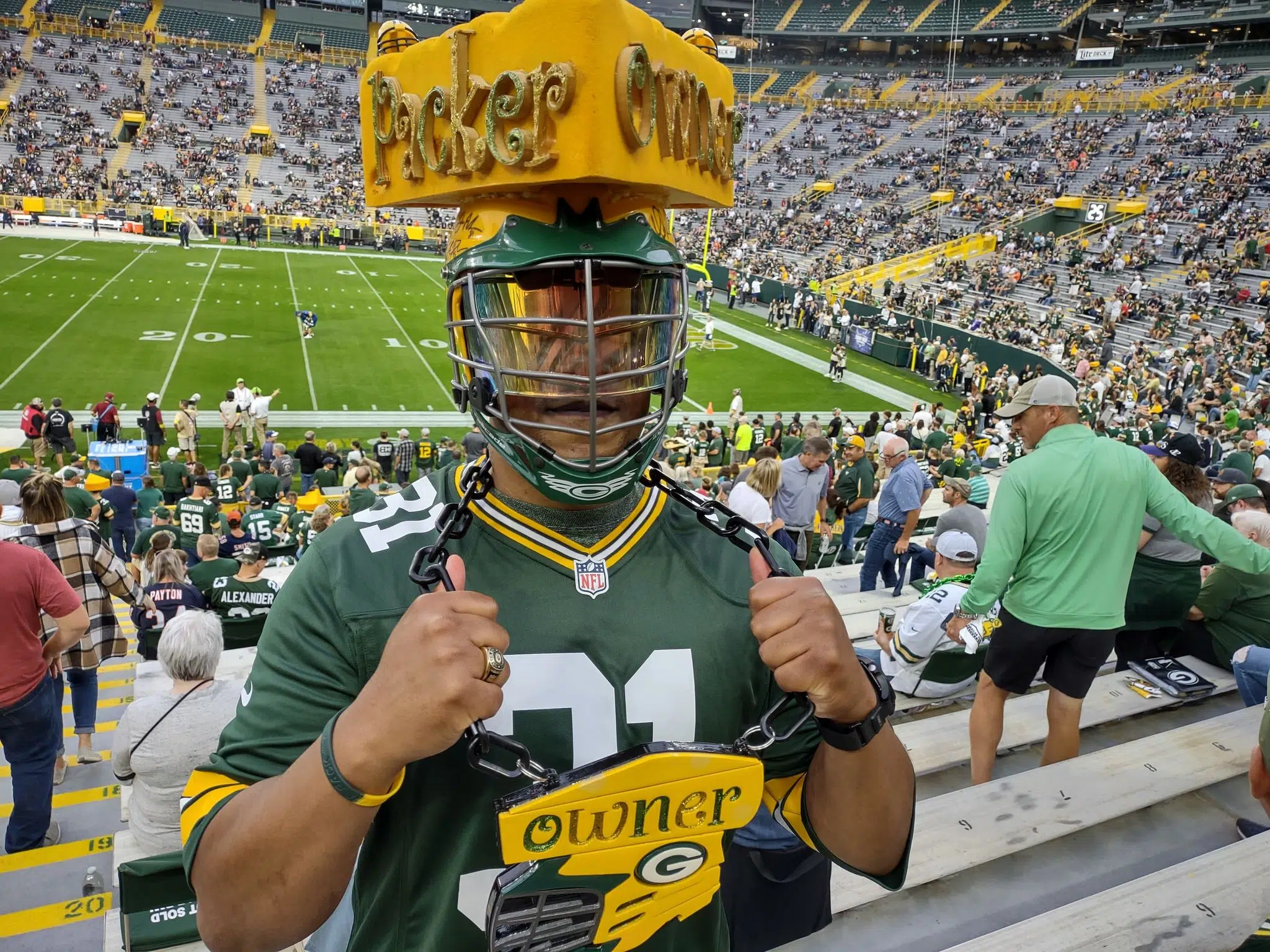 Green Bay Packers' fans who became owners stand with team