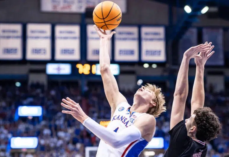 Kansas men to host Harvard, women lose in triple overtime at Nebraska