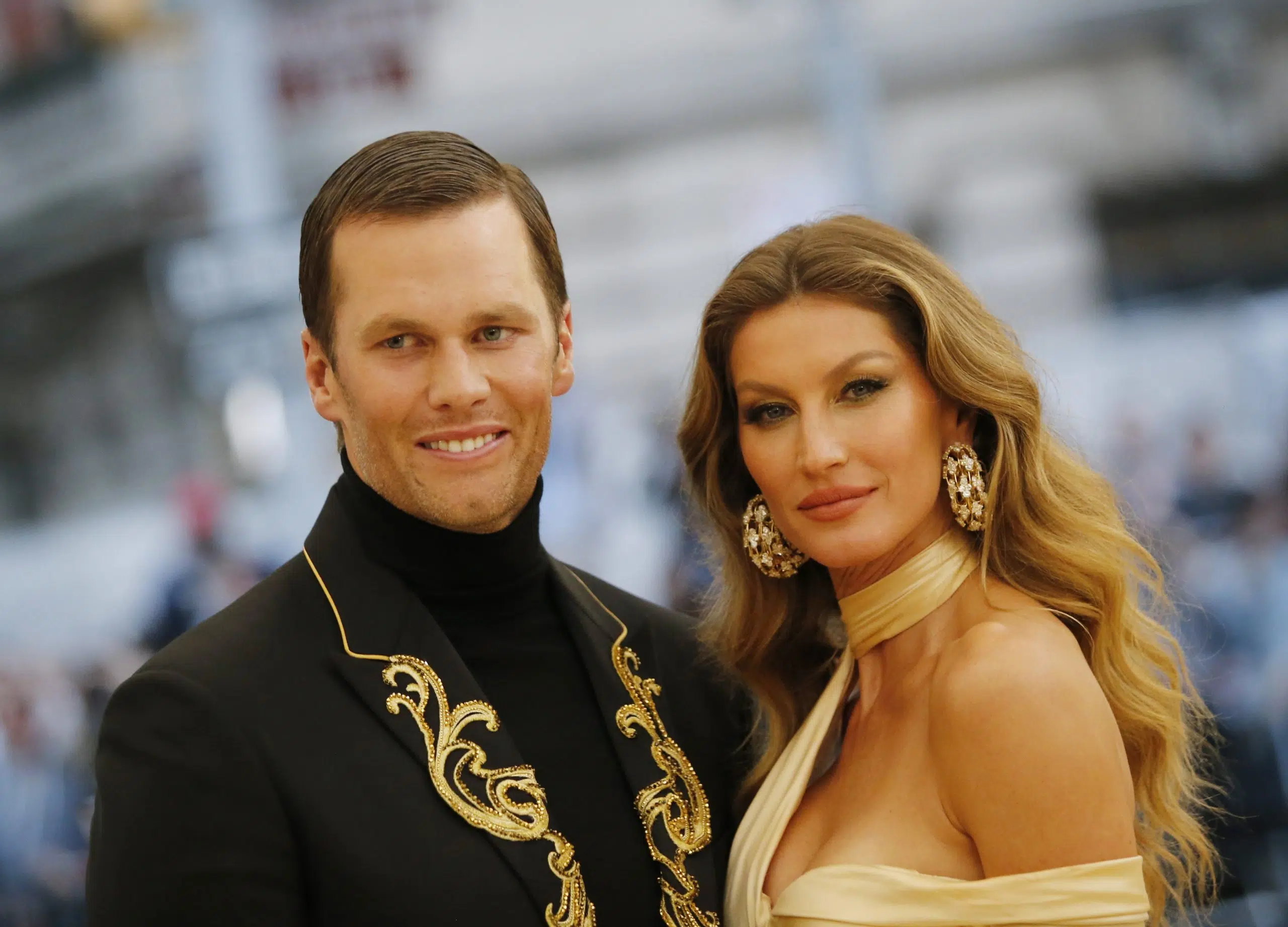 File photo - Tom Brady celebrates with his wife Gisele Bundchen