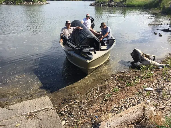 boaters collecting garbage