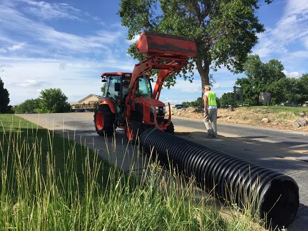 tractor hauling trash