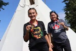 Treaty Six Eagles Player Raylee Tremblay with her assistant coach Trish Tremblay holding up the gold at the Alberta Indigenous Games (Photo Credits - Daniel Barker-Tremblay)