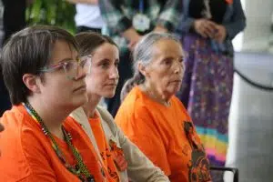 Women wearing Orange Shirts on Orange Shirt Day