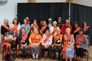 Metis Residential School Survivors donning the Orange Sash at Metis Crossing (Photo Credits- Daniel Barker-Tremblay)