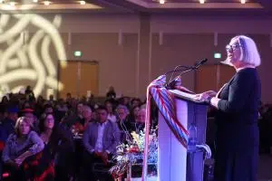 Former MNA President Audrey Poitras speaking at the Otipemisiwak Métis Government Swearing-in Ceremony