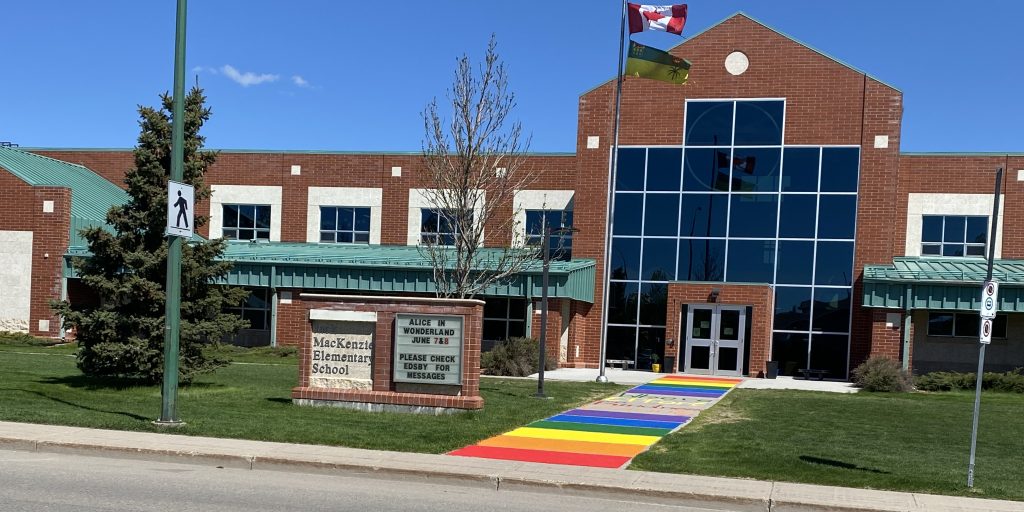 Rainbow sidewalk greeting those who enter MacKenzie School - Vimarsana News