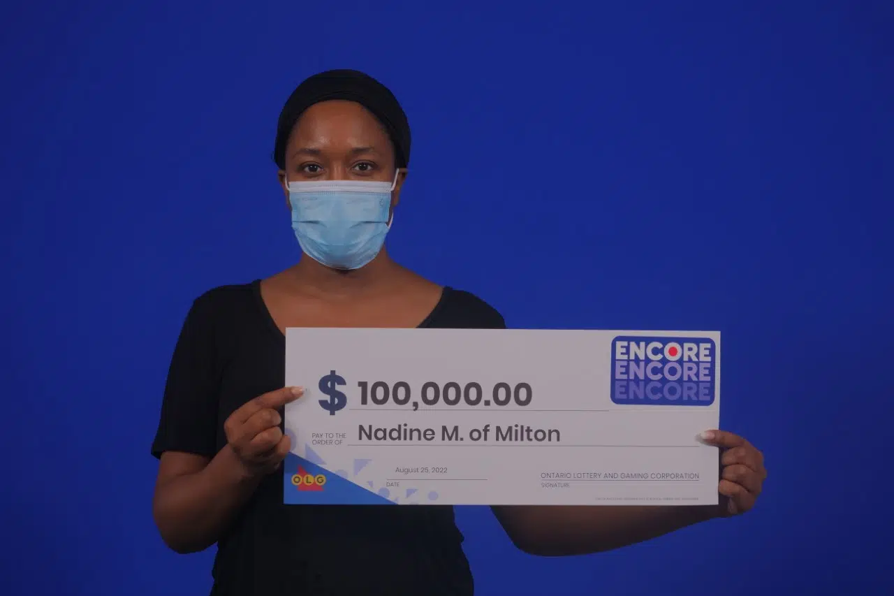 Milton resident finally collects lottery winnings after months of waiting