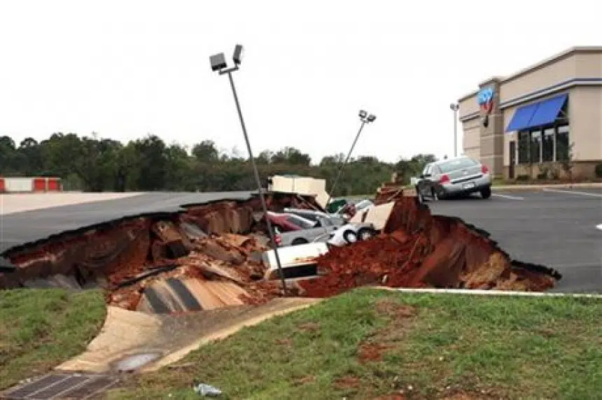 Restaurant parking lot cavein swallows 12 cars in Mississippi 980 CJME