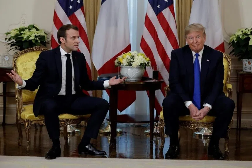 Trump barrels into NATO summit, clashes with France’s Macron