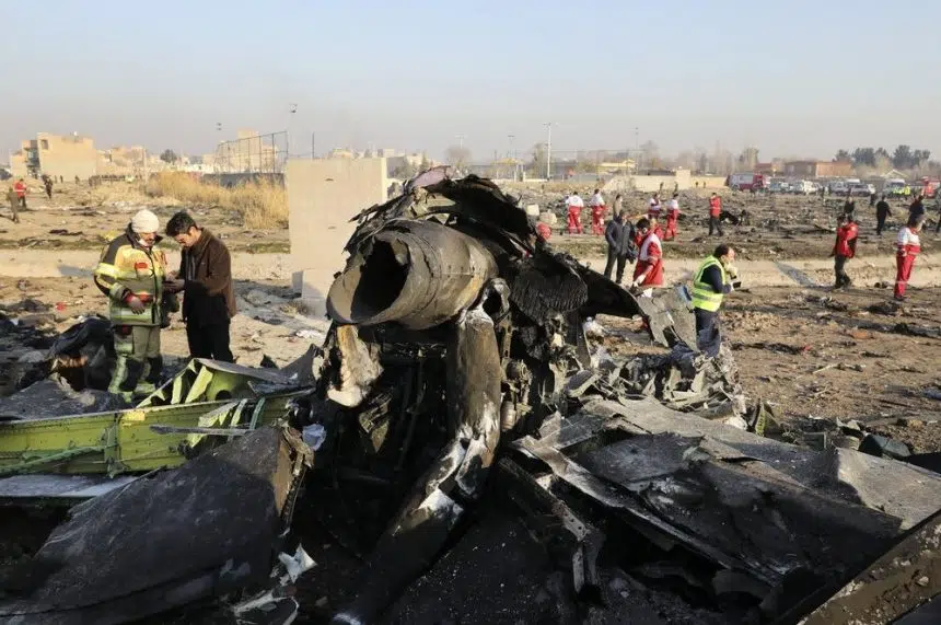 Verified videos show plane in Iran struck before fiery crash