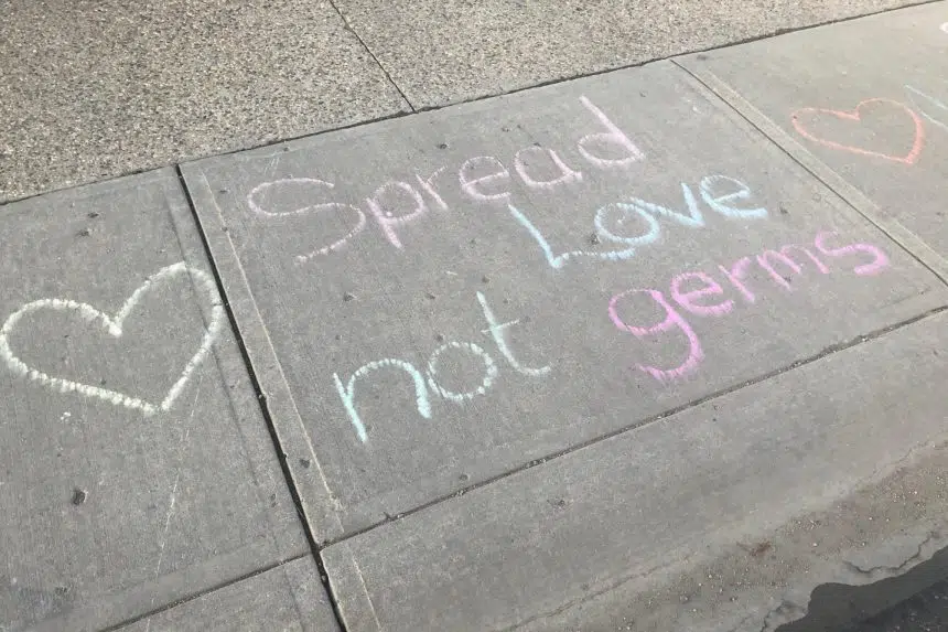 Hearts, chalk messages spread hope around the city