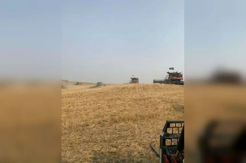 Farmers pitch in to help Sorensen family with harvest