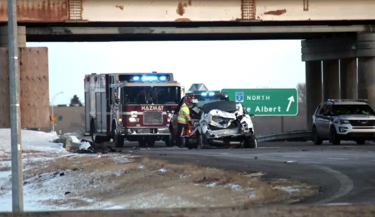 Vehicle launched off overpass, then was struck by semi-truck