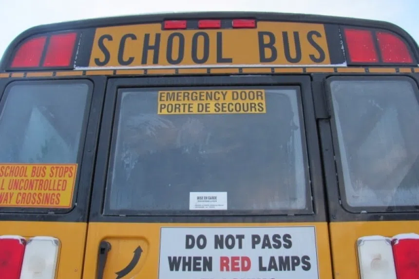 A close call: Empty school bus collides with semi near Delisle