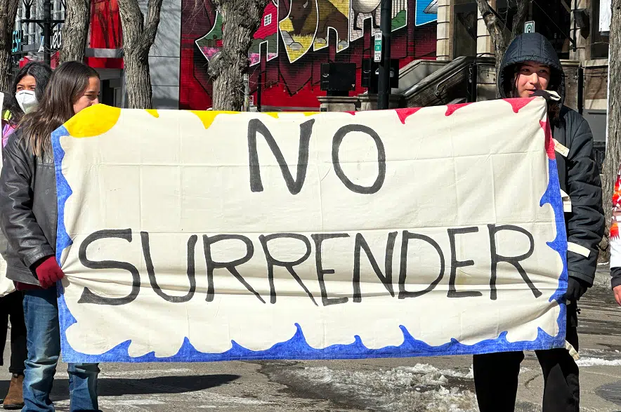 Environmental protesters take to Saskatoon streets outside RBC meeting