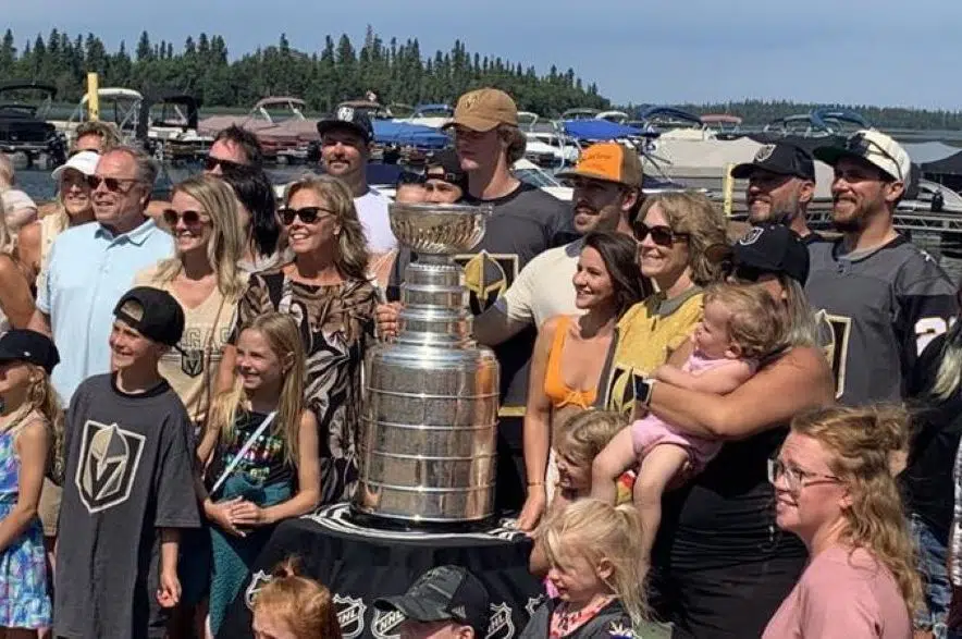 The Stanley Cup hits the beach at Emma Lake