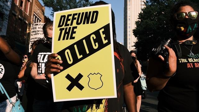 "Defund the police" made headlines. What does it look like now?